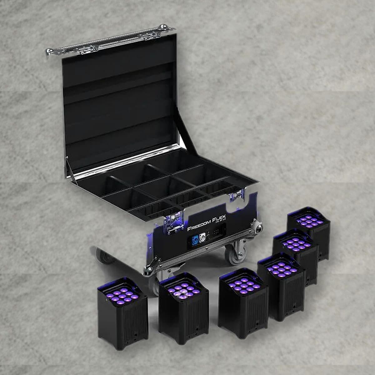 Seks Chauvet DJ Freedom Flex H9 IP uplights med lilla lys, foran åpen ladekoffert